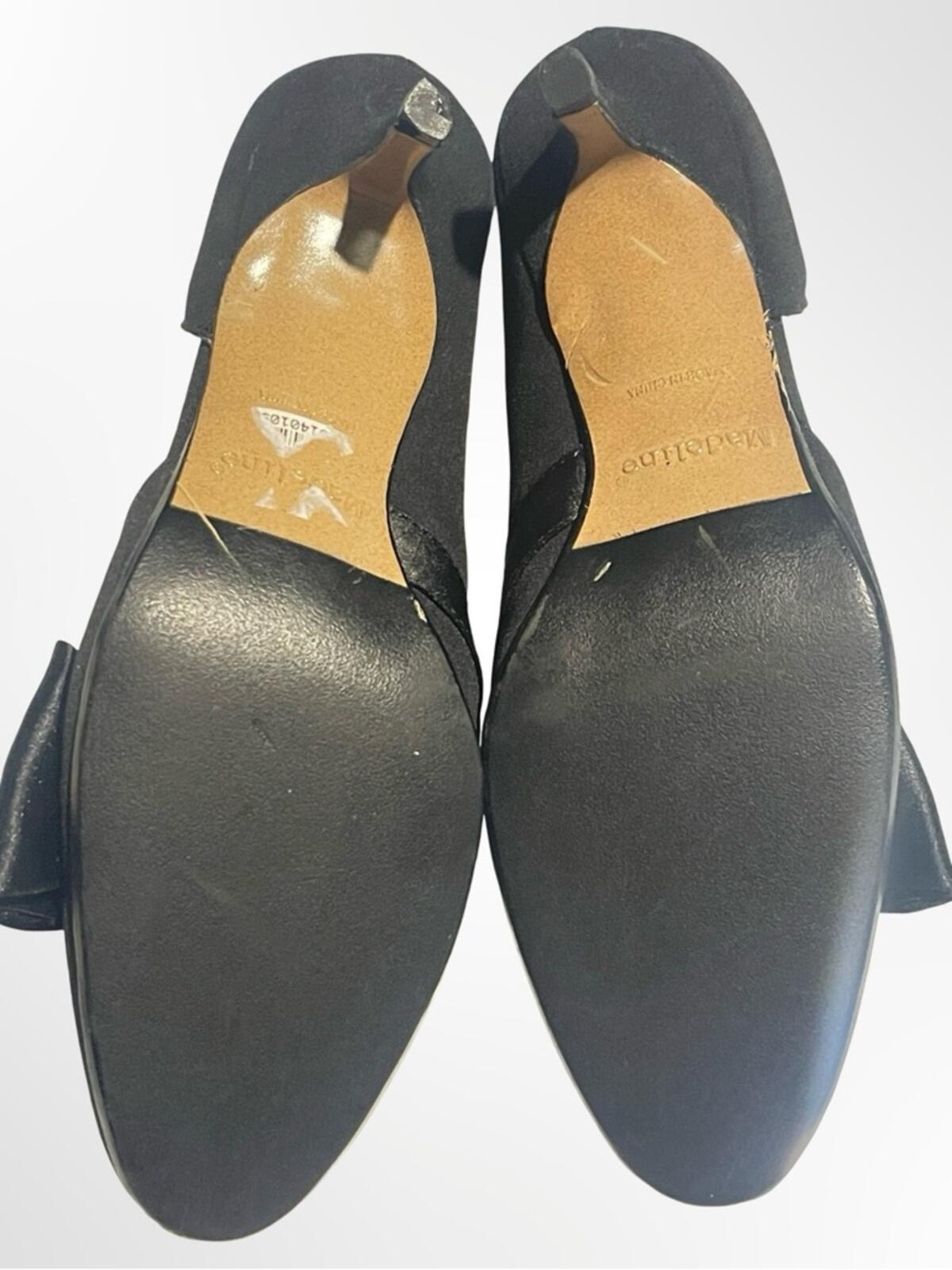 Madeline Black D'Orsay Bow Pumps in size 6.5