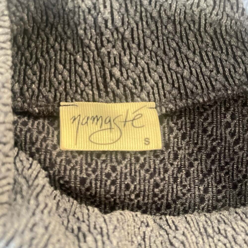 Namaste Sleeveless Mock Neck Asymmetric Knit Top