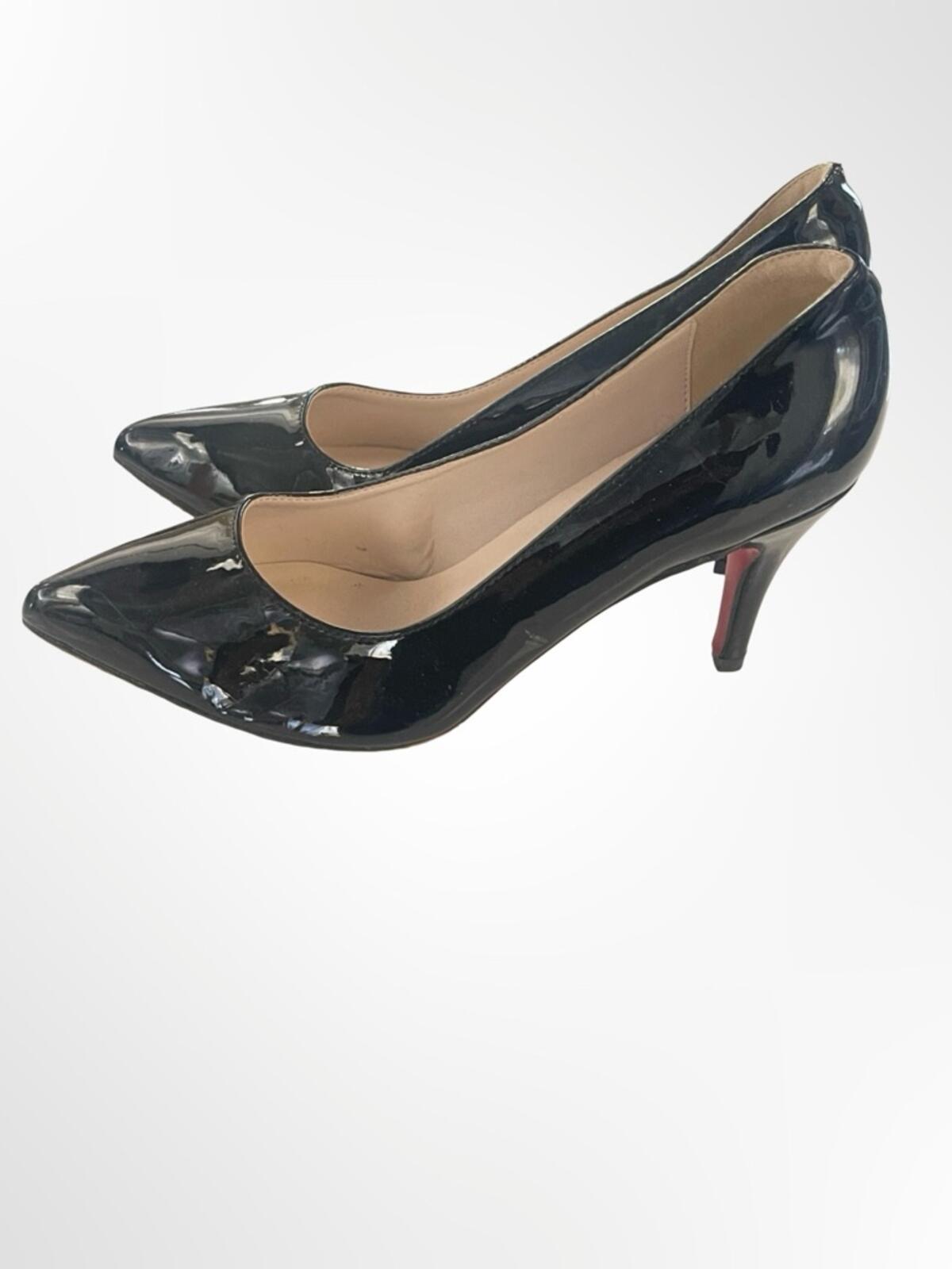 Classic Black Patent Pointed-Toe Women's Pumps in size 8.5