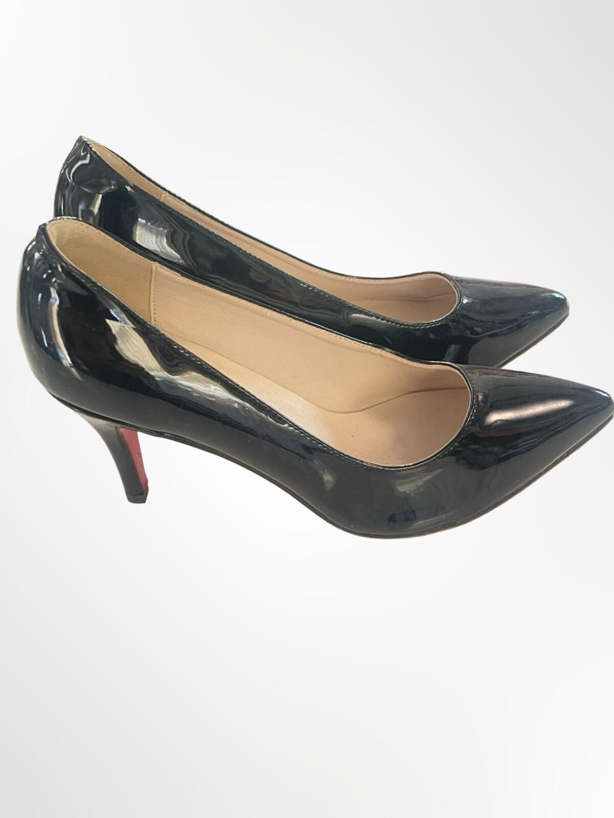 Classic Black Patent Pointed-Toe Women's Pumps in size 8.5