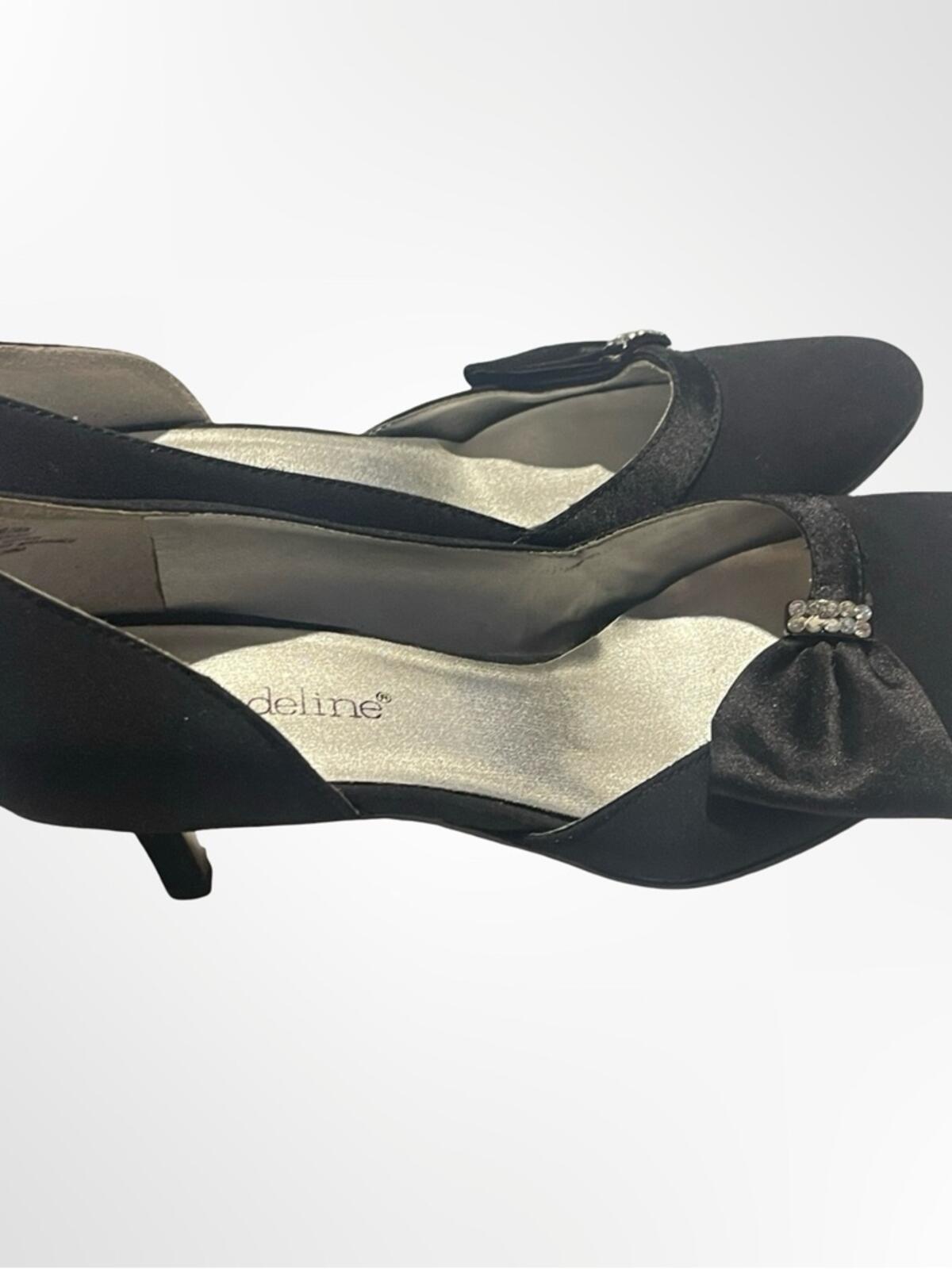 Madeline Black D'Orsay Bow Pumps in size 6.5