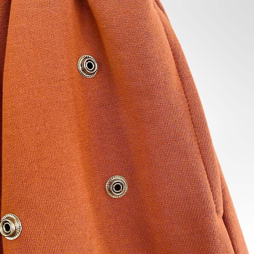 MNML All Over Studded Detail Drawstring Shorts in Rust