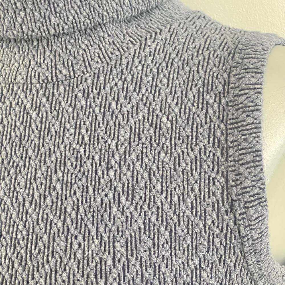 Namaste Sleeveless Mock Neck Asymmetric Knit Top