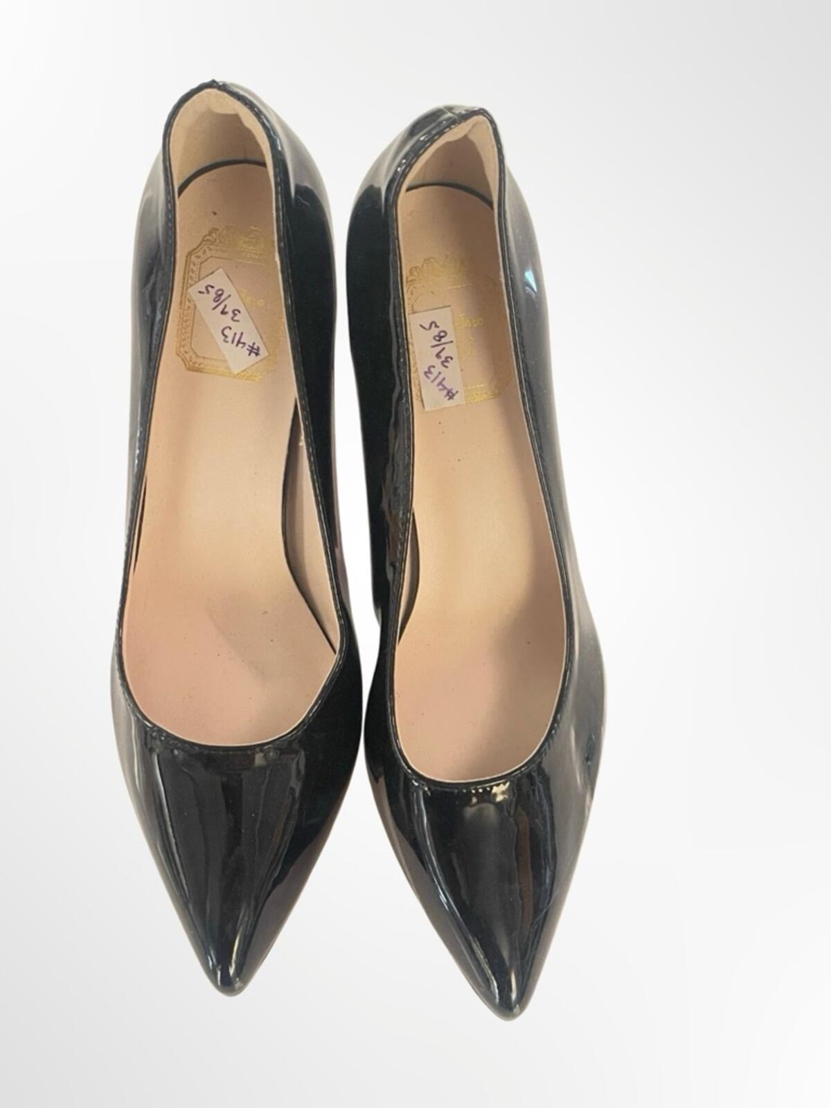 Classic Black Patent Pointed-Toe Women's Pumps in size 8.5